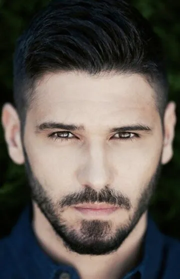 Фотография актёра Толгахан Сайышман