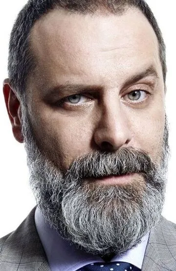 Фотография актёра Озан Гювен